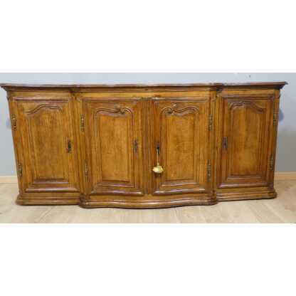 Enfilade de boiserie à ressaut d'époque Louis XV en chêne mouluré et sculpté, XVIII ème