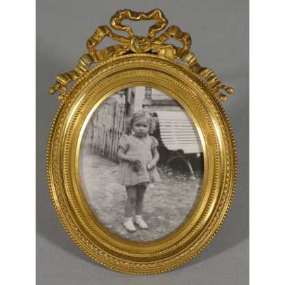 Petit cadre photo ovale en bronze doré style Louis XVI, époque XIX ème