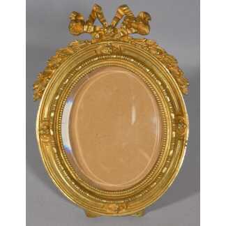 Cadre photo ovale de style Louis XVI en bronze doré, époque début XX ème