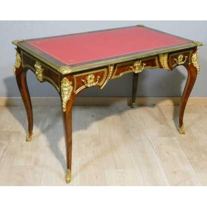 Estampillé Paul Sormani, bureau plat de style Régence en palissandre et bronze doré, XIX ème