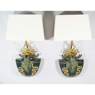Paire d'appliques aux béliers de style Napoléon III en bois et bronze