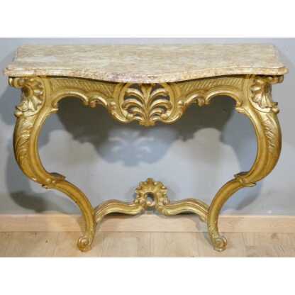 Console de style Louis XV en bois sculpté doré, époque début XX ème