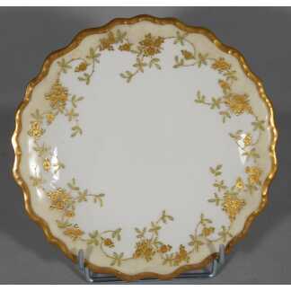 Assiette de collection en porcelaine de Limoges, décor peint à la main fleur d'or