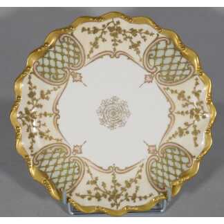 Assiette de collection en porcelaine de Limoges, décor peint à la main quadrillage