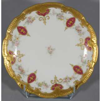 Assiette de collection en porcelaine de Limoges, décor peint à la main fleurs