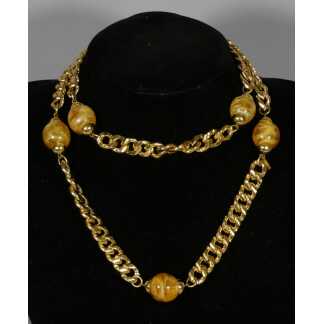 Yves Saint Laurent, collier sautoir vintage 1980 en métal doré et perles verre, YSL