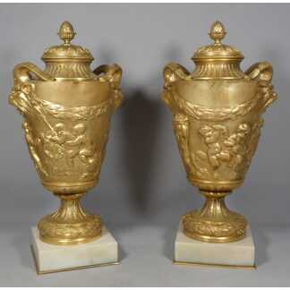 Paire de cassolettes en bronze doré dans le goût de Clodion, XIXᵉ siècle